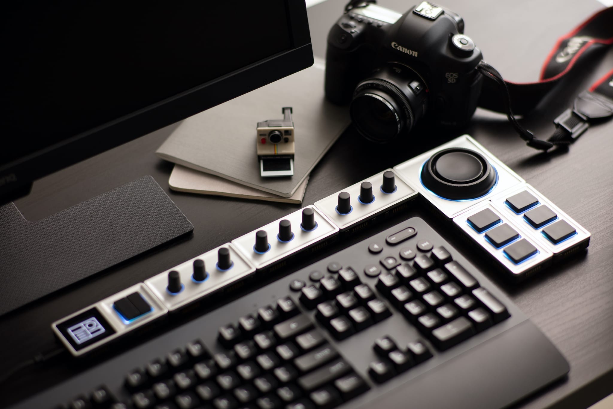 Monogram Creative Console with a computer keyboard and camera, unedited.